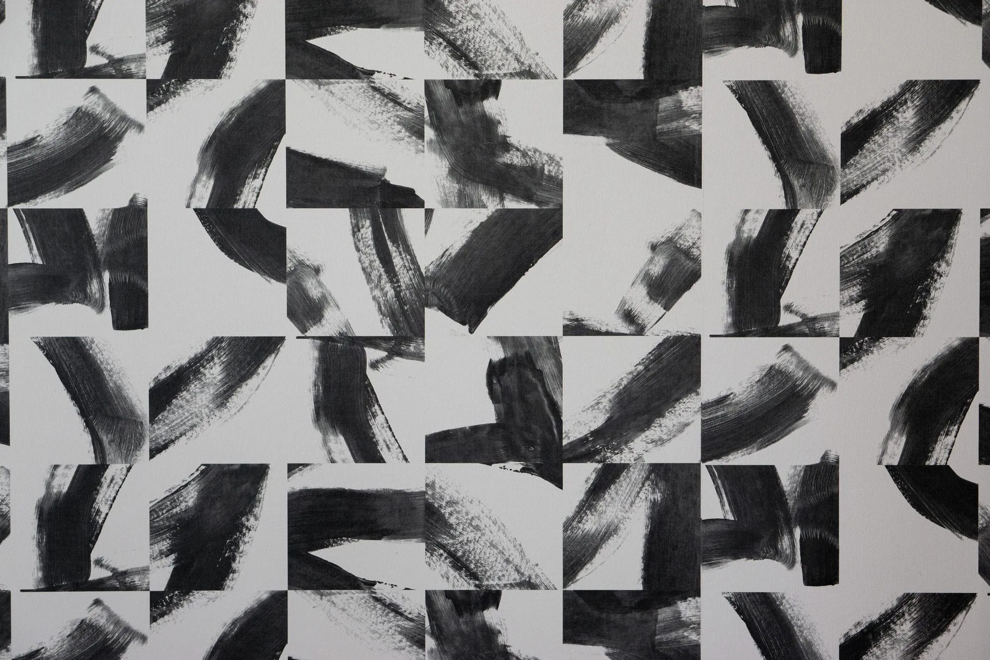 Multifamily interior detail: black and white brushstroke pattern tile