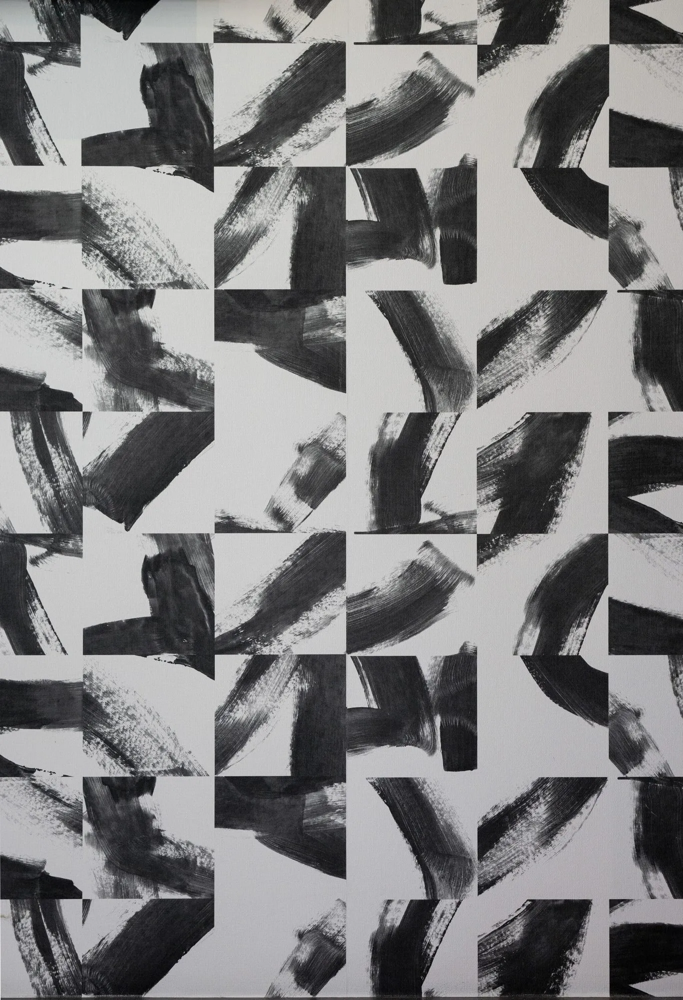 Multifamily interior detail: close-up of black and white brushstroke pattern tile