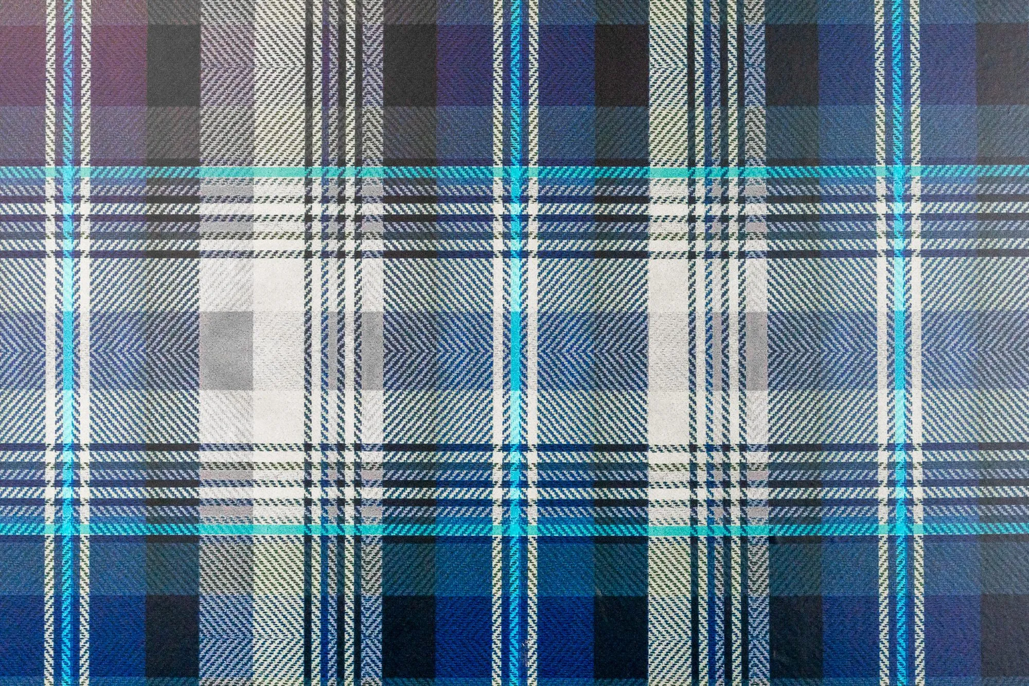 Multifamily amenity interior detail: blue, white and turquoise plaid wallpaper