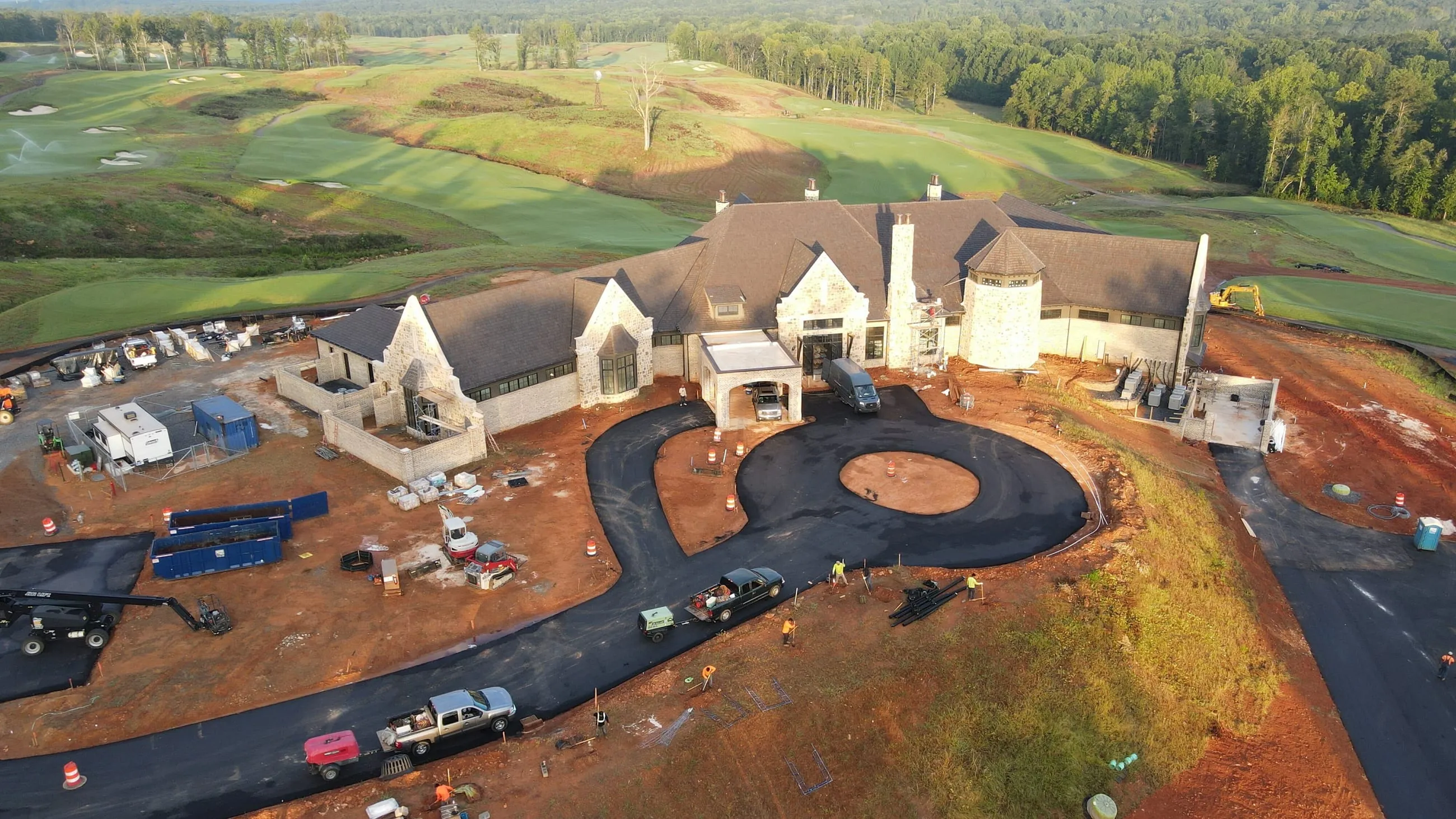 Private club clubhouse under construction: aerial view from the front, the roofline and the new entry drive