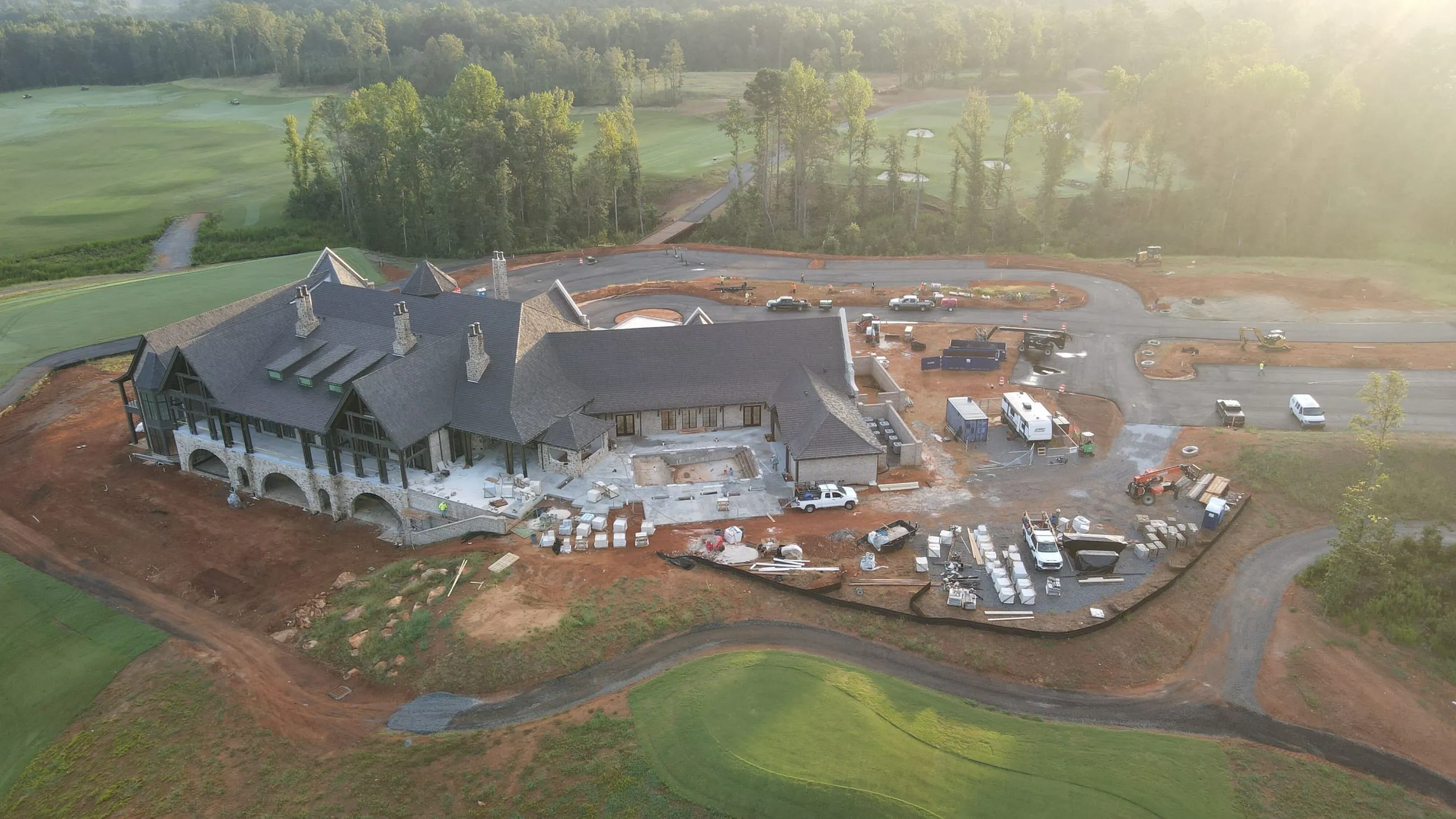 Private club clubhouse under construction: aerial view of the rear elevation and its terraces